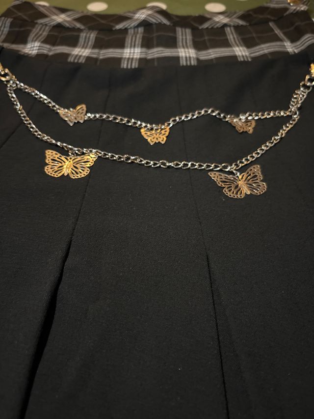 Lote 2 faldas plisadas negra y cuadros