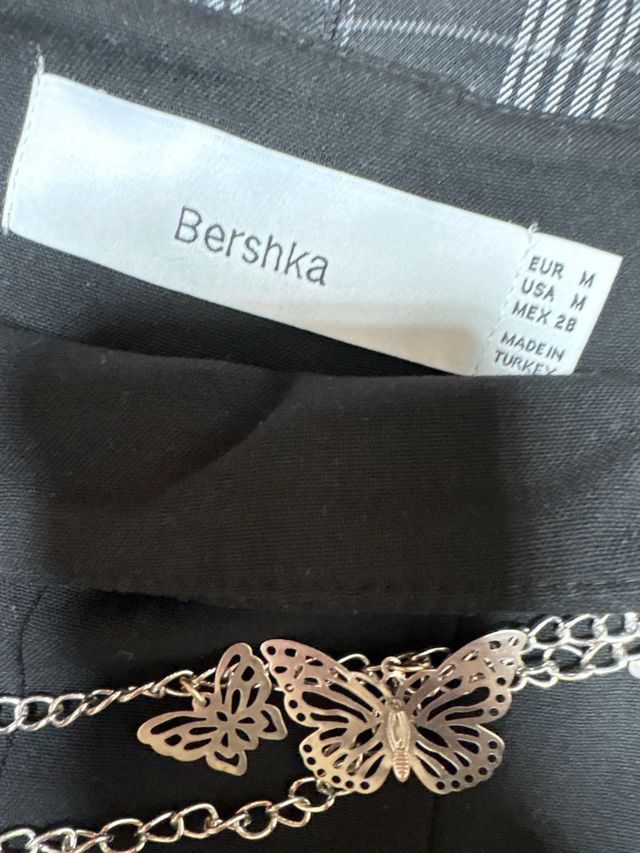 Lote 2 faldas plisadas negra y cuadros