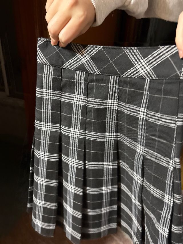 Lote 2 faldas plisadas negra y cuadros