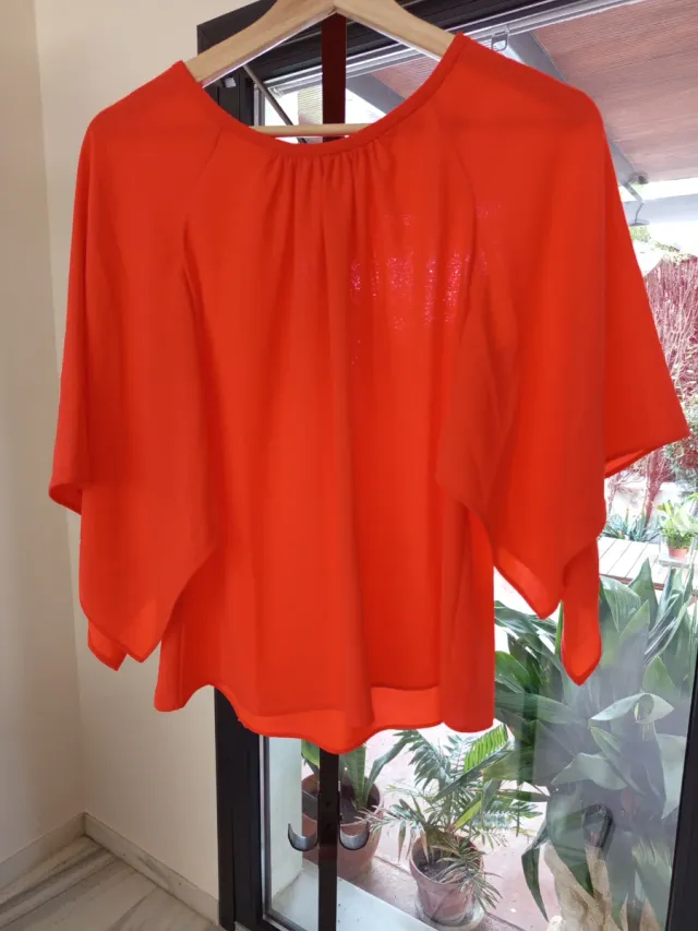 Blusa naranja manga pañuelo talla única