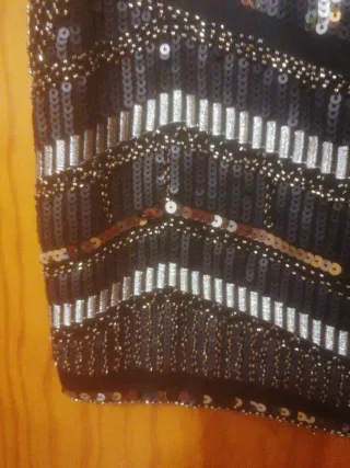 Falda de fiesta lentejuelas y flecos