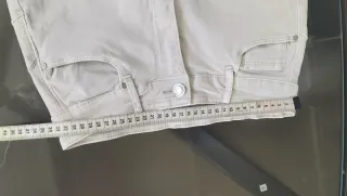 Pantalón vaquero acampanado elástico beige