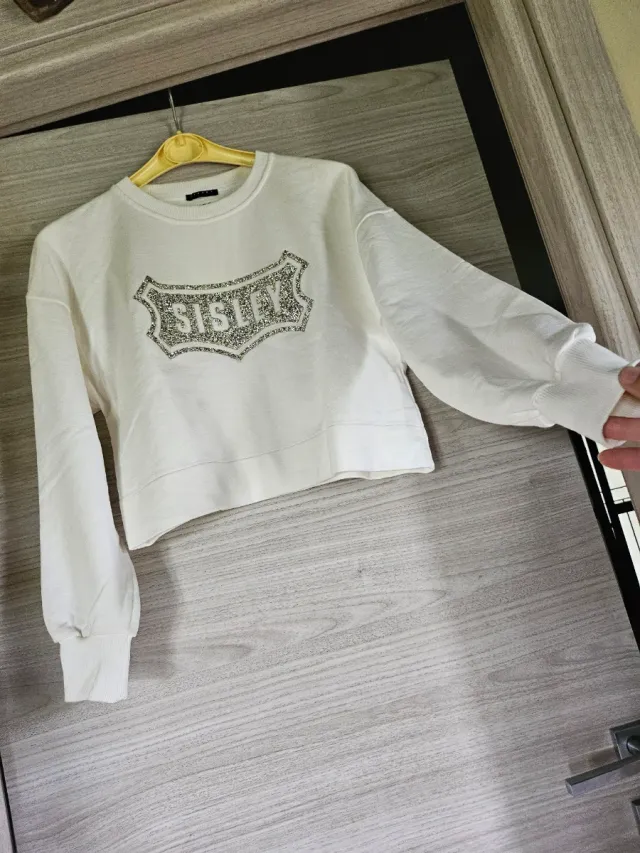 Felpa Sisley bianca con glitter