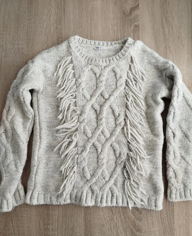 Jersey de lana trenzado con flecos