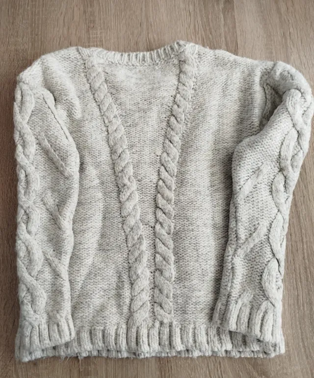 Jersey de lana trenzado con flecos