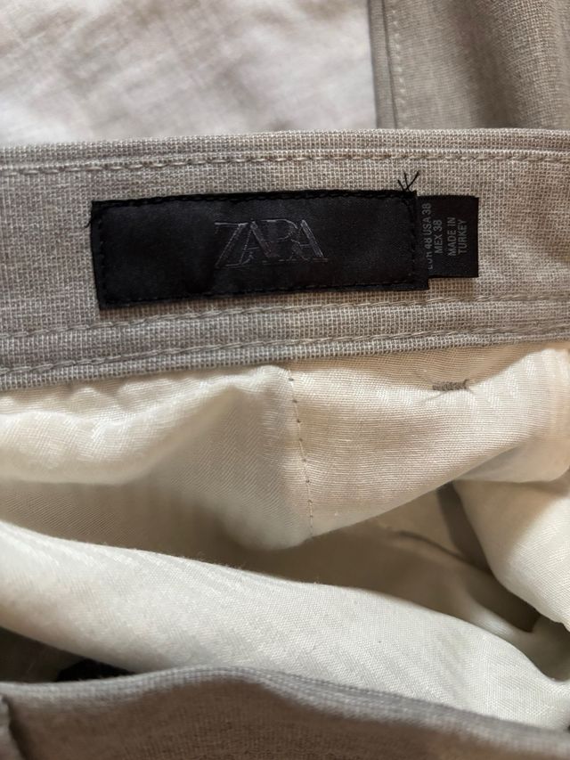 Pantalones de vestir Zara gris talla 48