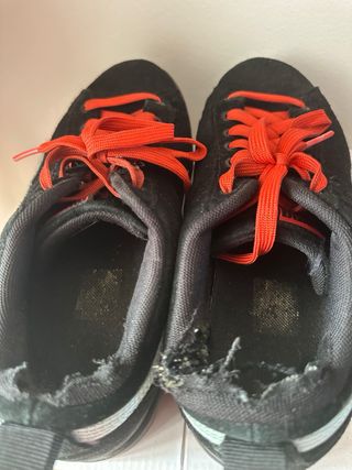 Sneakers Puma nere e rosa