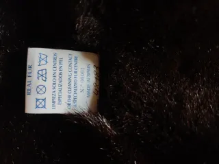 Abrigo piel cordero peletería oscuro