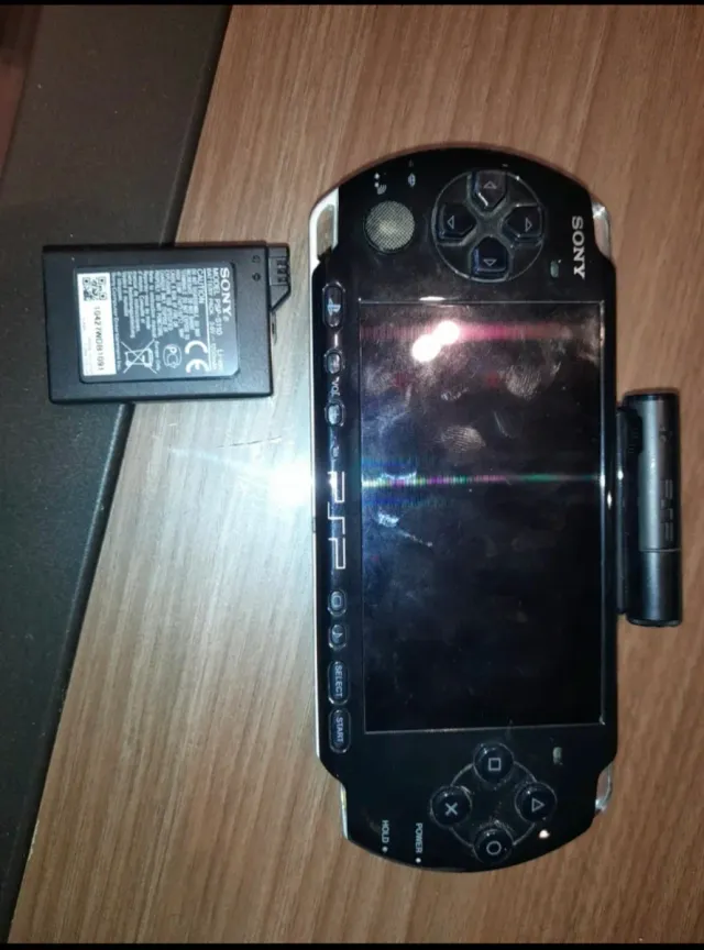 Console PSP + 6 giochi + fotocamera