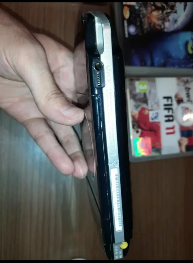 Console PSP + 6 giochi + fotocamera