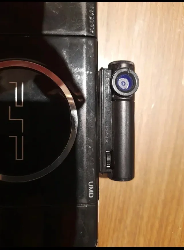 Console PSP + 6 giochi + fotocamera