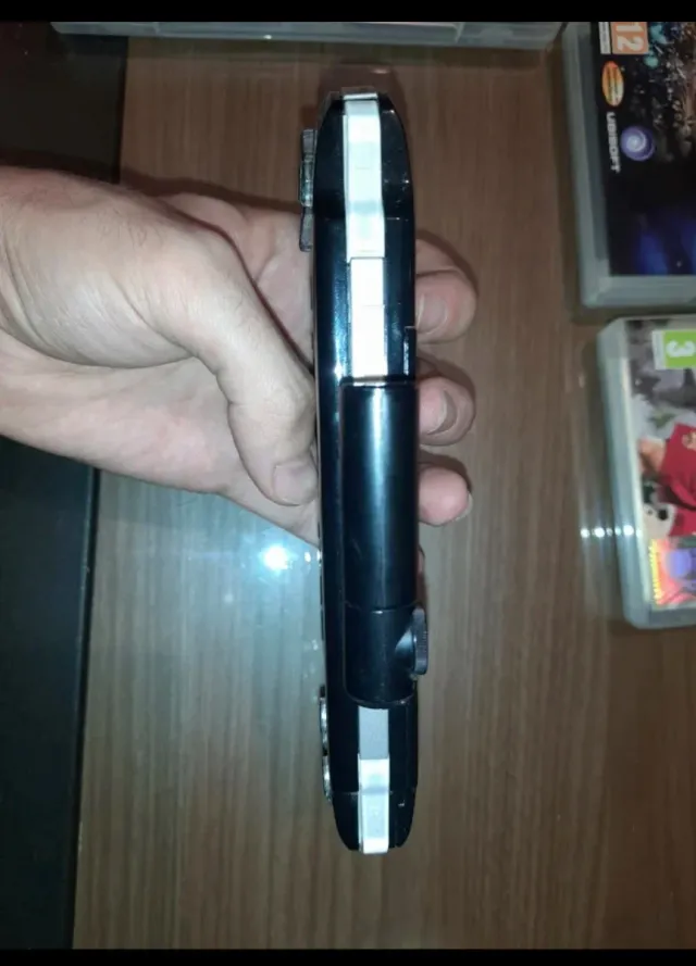 Console PSP + 6 giochi + fotocamera