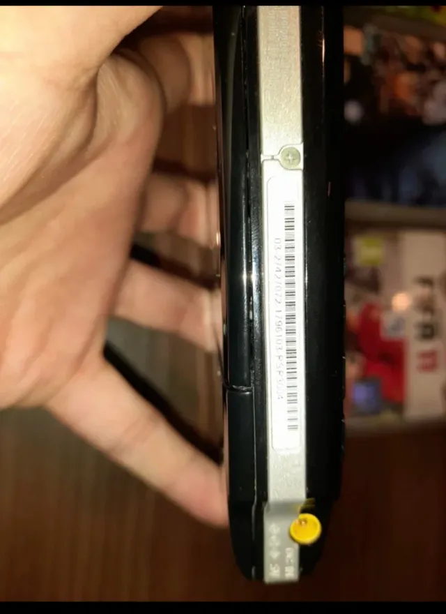 Console PSP + 6 giochi + fotocamera