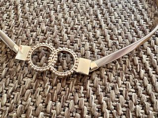 Cinturón metálico elástico dorado con doble círcul