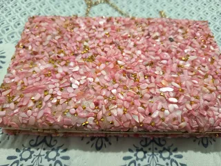 Bolso de fiesta rosa y dorada