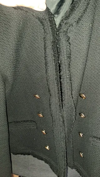 Chaqueta tipo Chanel negra