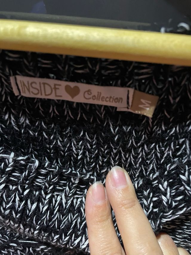 Jersey trenzado negro y blanco