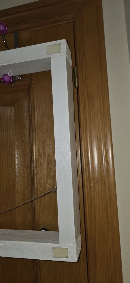 Portafoto decorativo con ganci