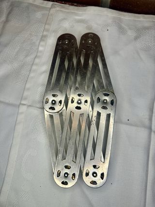 Salvamanteles extensible metálico