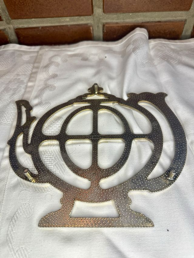 Salvamanteles metálico forma tetera