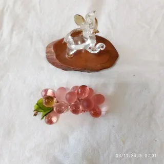 Elefante e uva in vetro