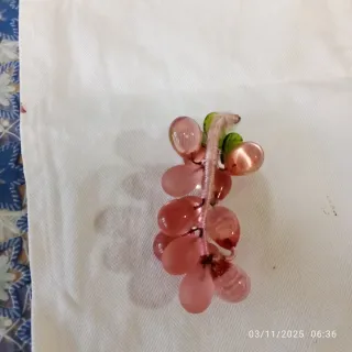 Elefante e uva in vetro