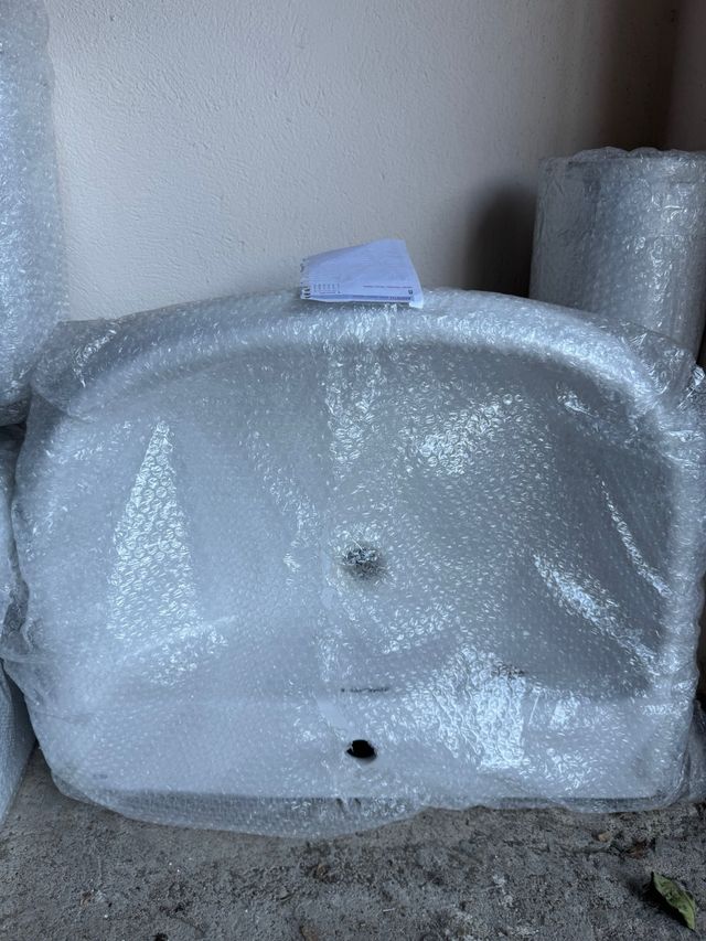 Lavabo de porcelana blanco