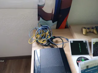 PlayStation 3 Negra + 7 Juegos + 2 Mandos