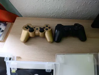 PlayStation 3 Negra + 7 Juegos + 2 Mandos