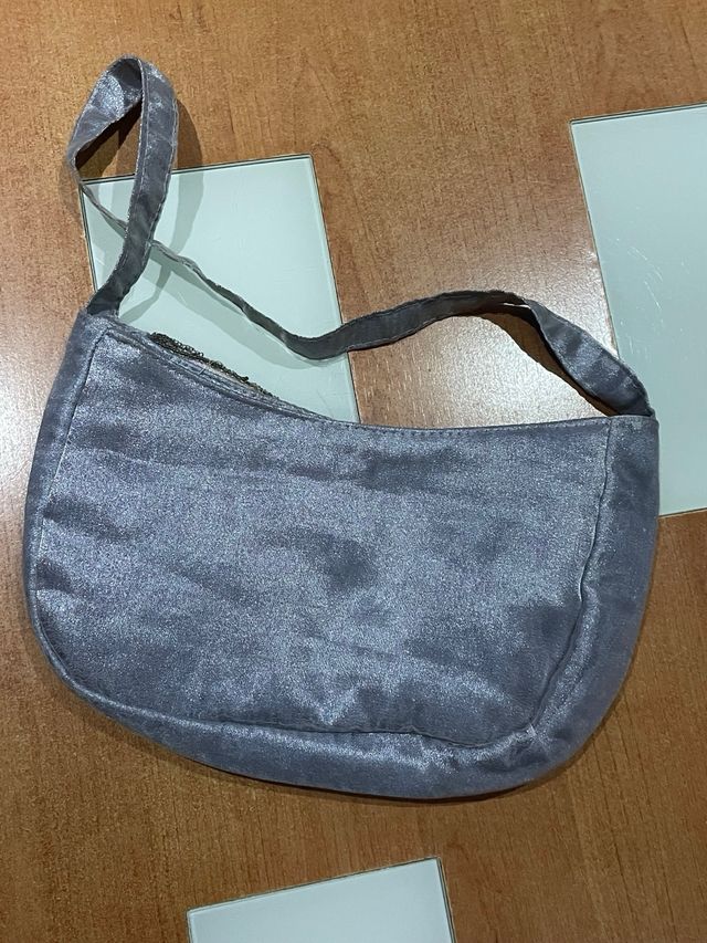Bolso de fiesta plateado con pedrería
