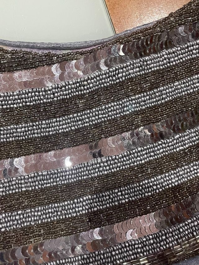 Bolso de fiesta plateado con pedrería