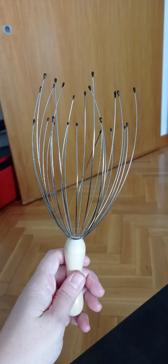 Masajeador de cabeza