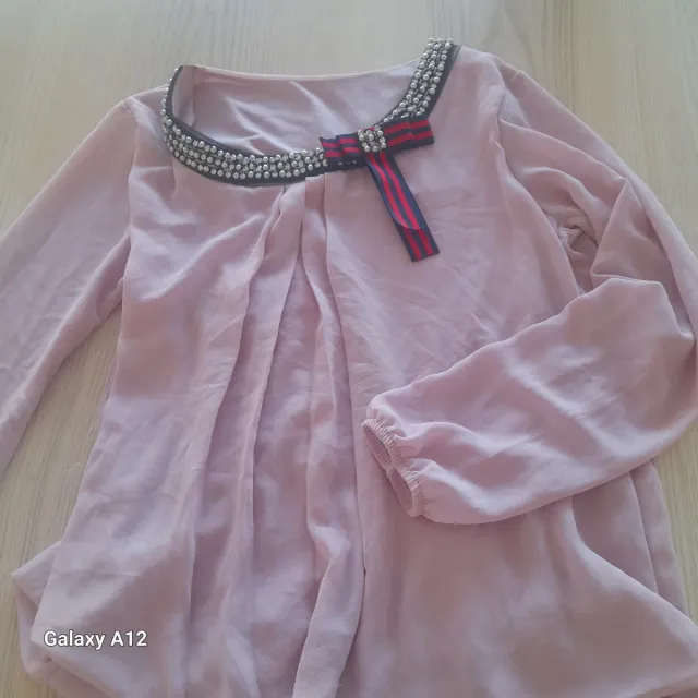 Blusa rosa con detalles
