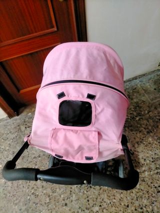 Carro de bebé rosa y gris