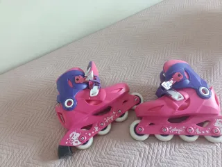 Patines en línea rosas y morados para niña