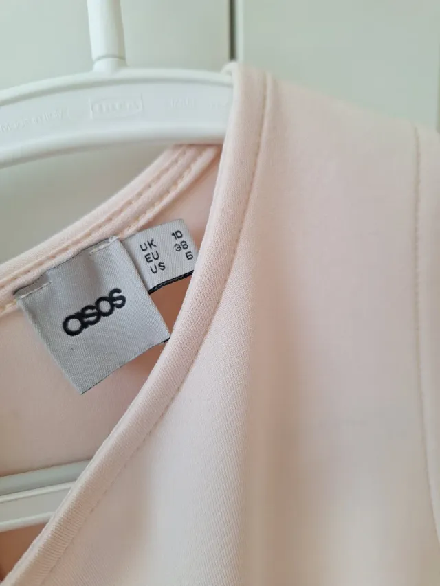 Top rosa peplum sin mangas