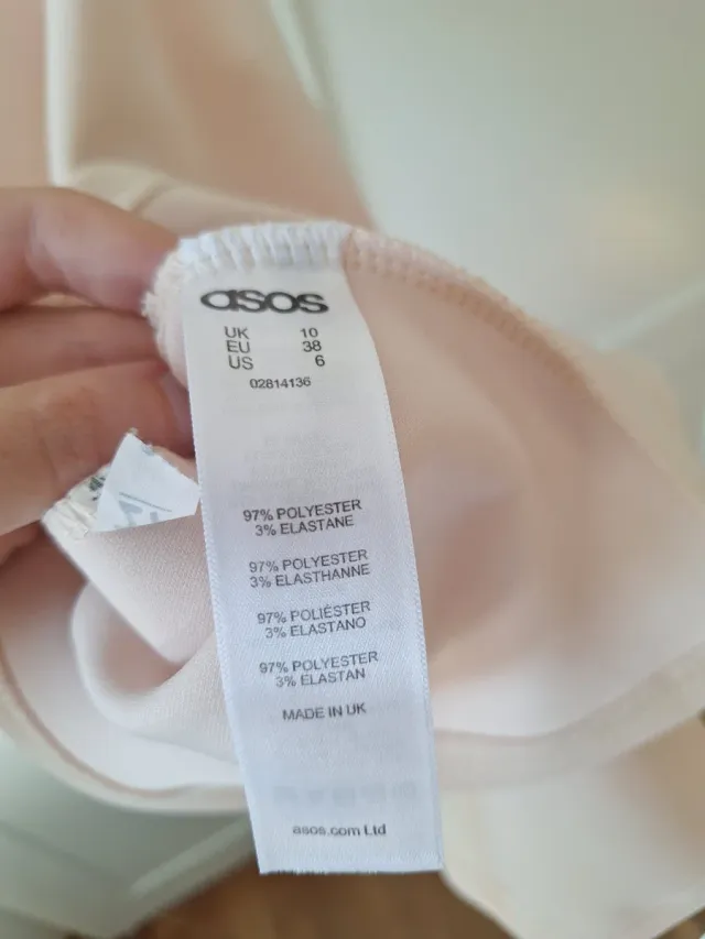 Top rosa peplum sin mangas