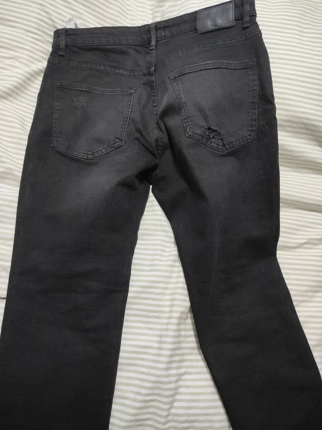 Vaqueros negros rotos chico