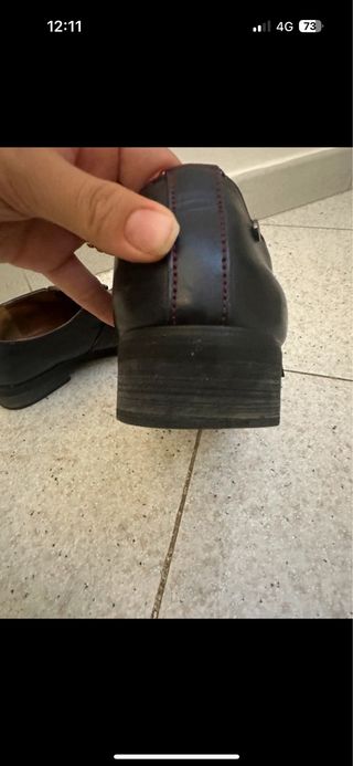 Mocassini donna neri con fibbia e frange