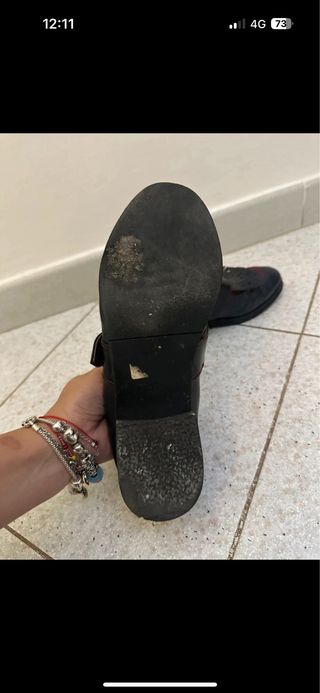 Mocassini donna neri con fibbia e frange