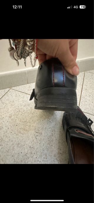 Mocassini donna neri con fibbia e frange