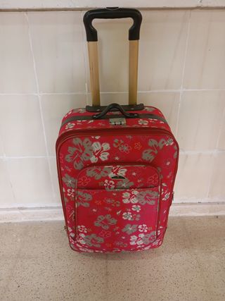 Maleta de viaje rosa con flores
