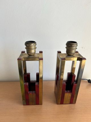 Coppia di lampade in metallo dorato 