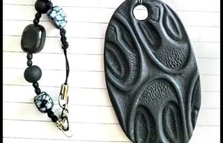 Collana pietra lavica ciondolo ovale