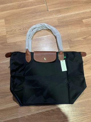 Mala Longchamp preta e castanha