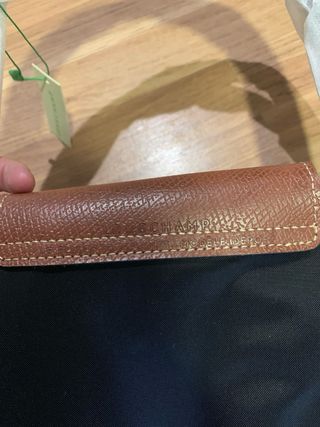 Mala Longchamp preta e castanha