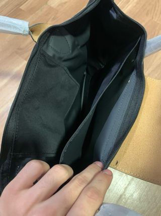 Mala Longchamp preta e castanha