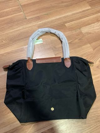 Mala Longchamp preta e castanha