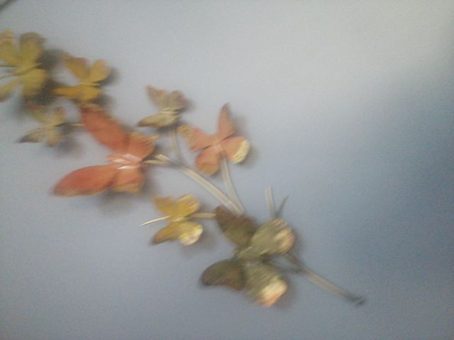 Rama de mariposas decorativa de metal