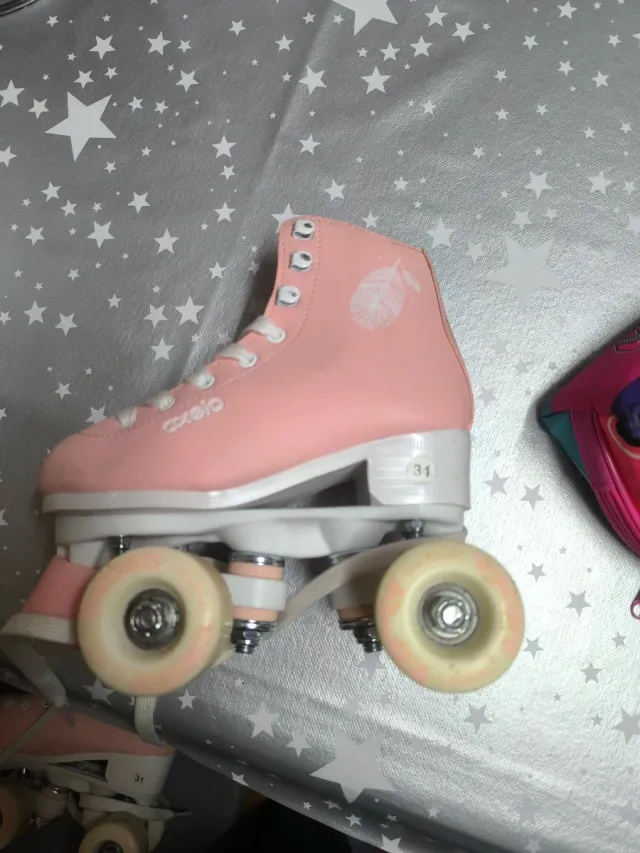 Pattini Oxelo rosa taglia 31